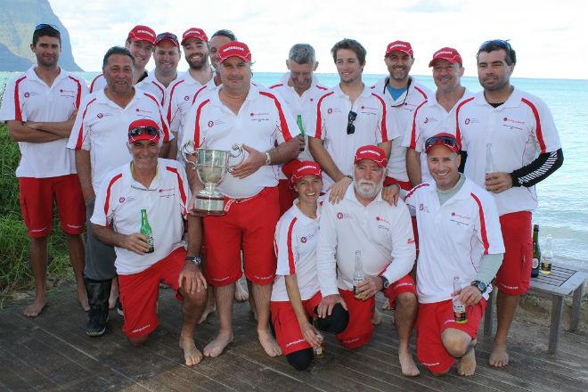 Hempel Gosford to Lord Howe Island Yacht Race 2013 -  SEx II crew pose for group shot outside the Pinetrees boatshed. © Ashleigh Evans